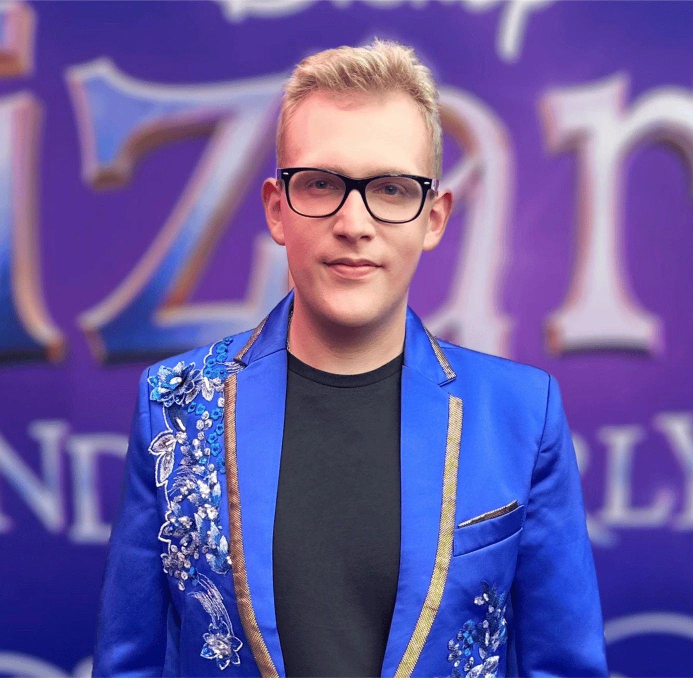 Jacob Bellotti in a blue sequined jacket